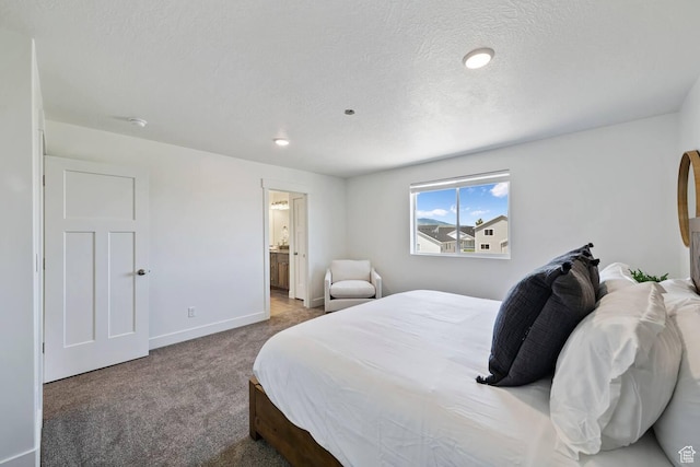 2250 S Beachcomber Ln, Garden City, UT 84028 - carpeted bedroom with baseboards and connected bathroom