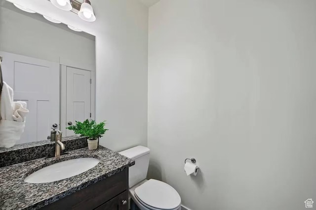 2250 S Beachcomber Ln, Garden City, UT 84028 - half bathroom with toilet and vanity
