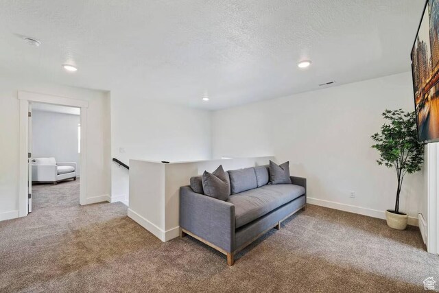 2250 S Beachcomber Ln, Garden City, UT 84028 - living room featuring carpet flooring, baseboards, visible vents, and recessed lighting