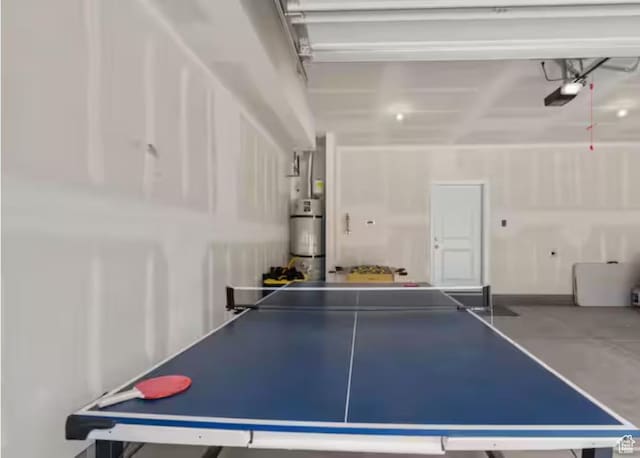 2250 S Beachcomber Ln, Garden City, UT 84028 - rec room featuring water heater and a garage