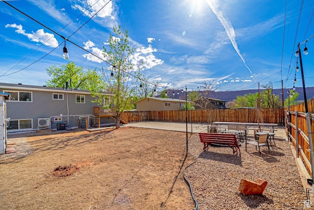 524 Westwood Ave, Moab, UT 84532 - view of yard featuring a patio area and fence
