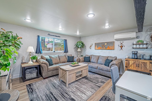 524 Westwood Ave, Moab, UT 84532 - living room featuring light wood-style flooring, recessed lighting, and a wall unit AC
