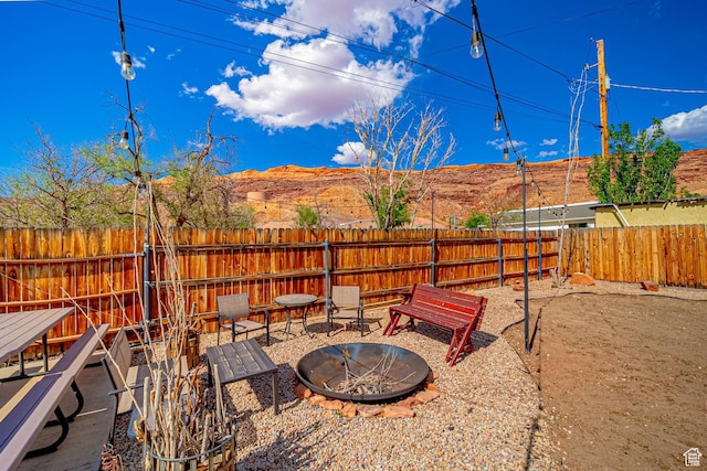 524 Westwood Ave, Moab, UT 84532 - exterior space with a fenced backyard and a fire pit