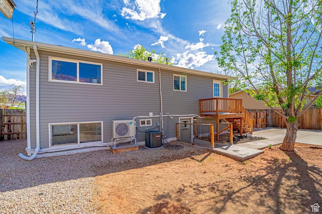 524 Westwood Ave, Moab, UT 84532 - rear view of property featuring a patio, stairs, fence private yard, and central AC