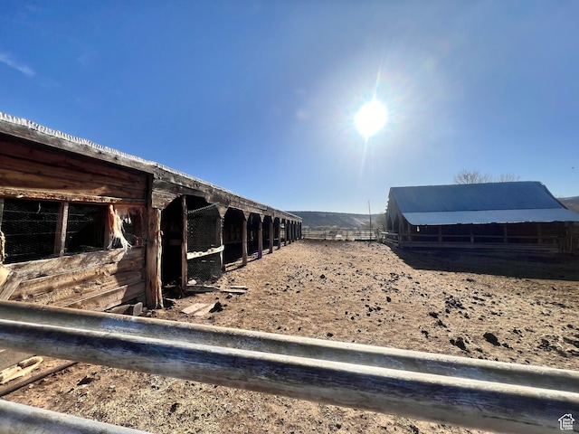 view of yard with an exterior structure and an outdoor structure