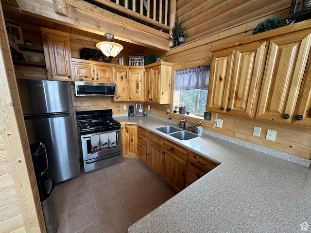 1741 S Red Canyon Dr, Parowan, UT 84761 - kitchen with open shelves, a sink, light countertops, stainless steel appliances, and tile patterned flooring