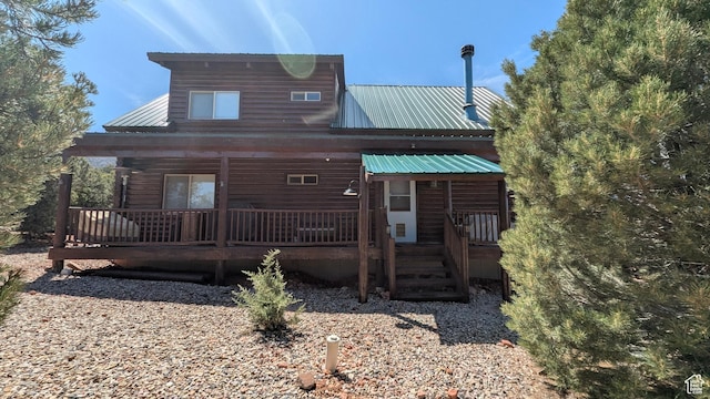 1741 S Red Canyon Dr, Parowan, UT 84761 - back of house featuring covered porch and metal roof
