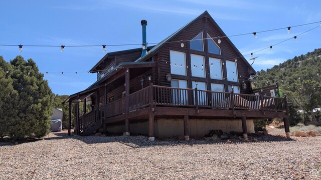 1741 S Red Canyon Dr, Parowan, UT 84761 - back of property featuring a wooden deck and log siding