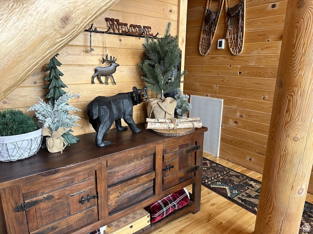 1741 S Red Canyon Dr, Parowan, UT 84761 - mudroom featuring wooden walls, visible vents, and wood finished floors