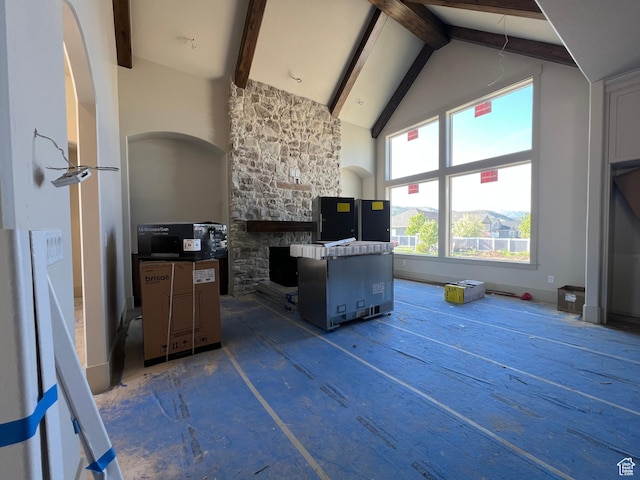 177 E 475 S, Mantua, UT 84324 - interior space with high vaulted ceiling, beamed ceiling, and a stone fireplace