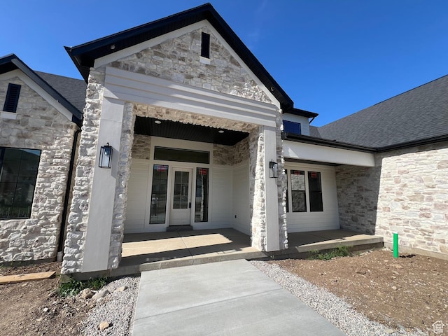 177 E 475 S, Mantua, UT 84324 - entrance to property with stone siding, covered porch, and roof with shingles