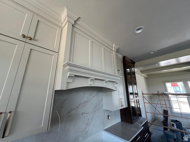 177 E 475 S, Mantua, UT 84324 - kitchen with dark stone counters, white cabinets, recessed lighting, and tasteful backsplash