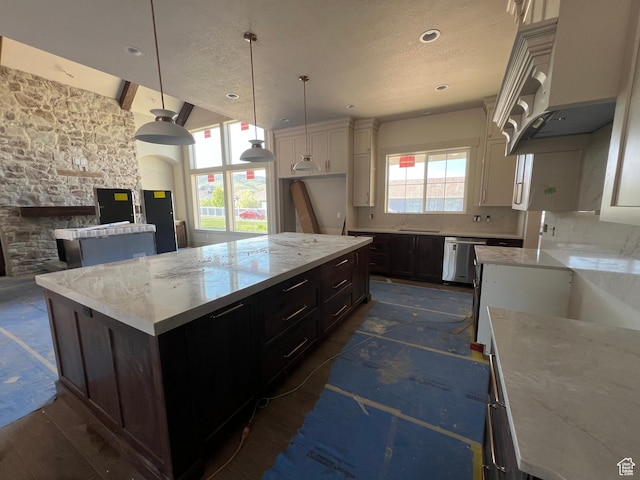 177 E 475 S, Mantua, UT 84324 - kitchen featuring stainless steel dishwasher, a center island, decorative light fixtures, light stone countertops, and open floor plan