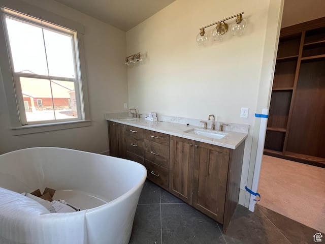 177 E 475 S, Mantua, UT 84324 - bathroom featuring a freestanding bath, tile patterned flooring, and double vanity