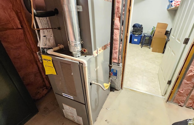 6723 W Hunter Farm Cir S, West Valley City, UT 84128 - utility room featuring heating unit