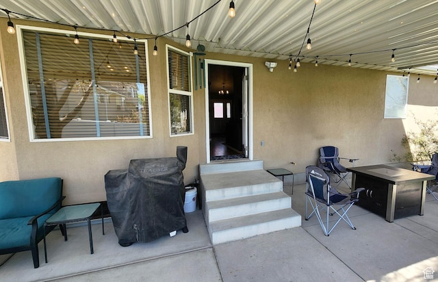 6723 W Hunter Farm Cir S, West Valley City, UT 84128 - doorway to property featuring stucco siding and a patio