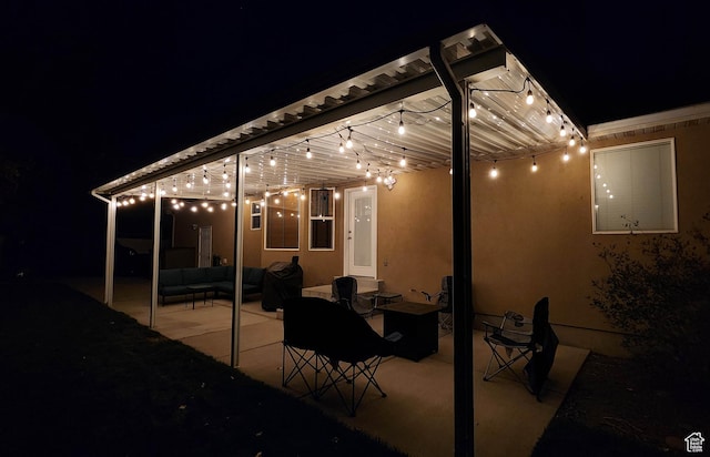 6723 W Hunter Farm Cir S, West Valley City, UT 84128 - patio at night with outdoor lounge area