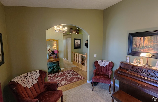 6723 W Hunter Farm Cir S, West Valley City, UT 84128 - sitting room featuring arched walkways and carpet
