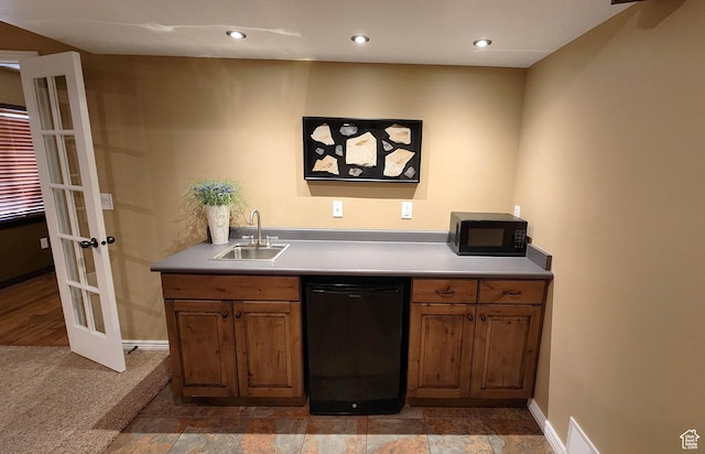 6723 W Hunter Farm Cir S, West Valley City, UT 84128 - indoor wet bar featuring black appliances, french doors, baseboards, and recessed lighting