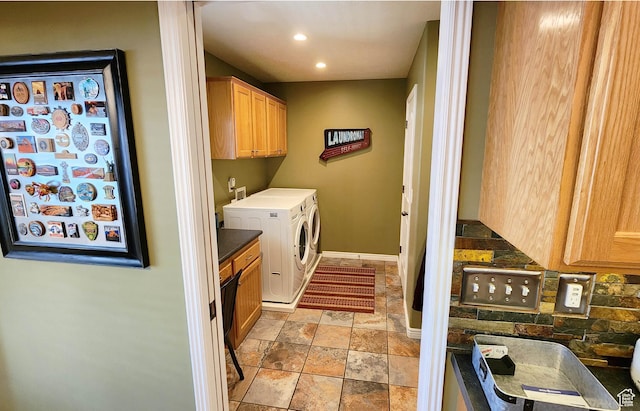 6723 W Hunter Farm Cir S, West Valley City, UT 84128 - washroom featuring cabinet space, separate washer and dryer, stone tile flooring, recessed lighting, and baseboards