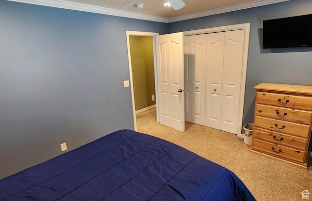 6723 W Hunter Farm Cir S, West Valley City, UT 84128 - bedroom with light carpet, ornamental molding, a closet, baseboards, and ceiling fan
