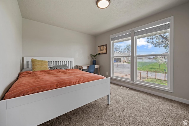 1308 Gilman Dr, Layton, UT 84040 - carpeted bedroom featuring baseboards, visible vents, and a textured ceiling