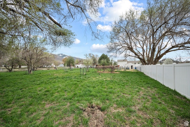 1308 Gilman Dr, Layton, UT 84040 - view of yard featuring fence and a mountain view