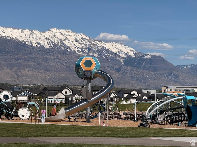 exterior space with a mountain view and a residential view
