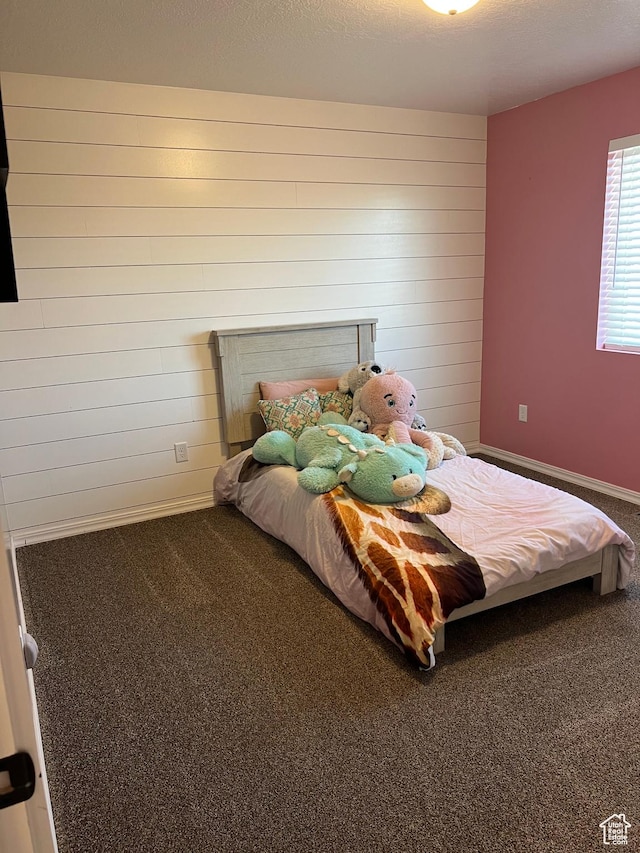 247 N 300 E, Fairview, UT 84629 - carpeted bedroom with baseboards and wood walls