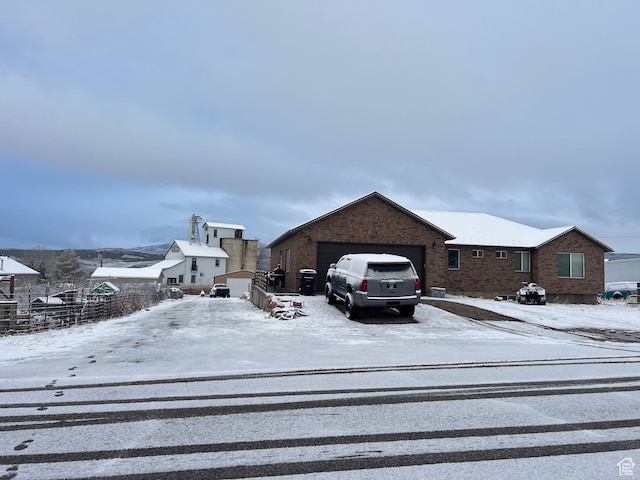 247 N 300 E, Fairview, UT 84629 - view of front facade featuring a garage and brick siding