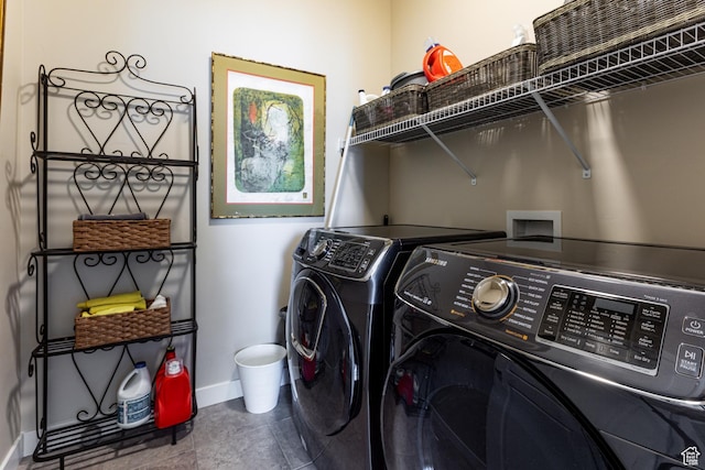 laundry area with baseboards, tile patterned floors, laundry area, and independent washer and dryer