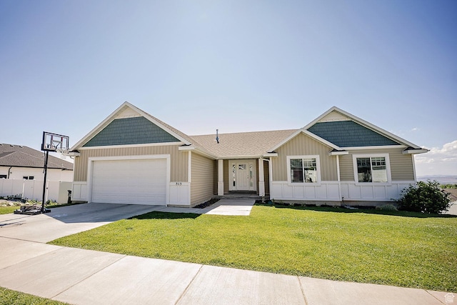 869 S 500 E, Providence, UT 84332 - single story home featuring a garage, board and batten siding, a front lawn, and concrete driveway