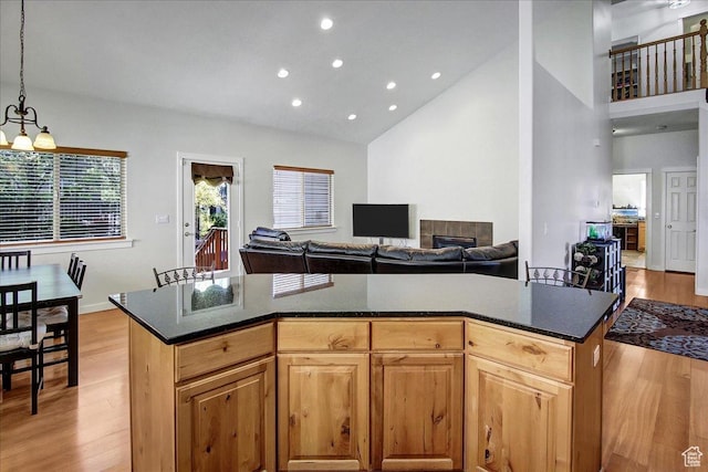 10716 N Hayes Cir, Cedar Hills, UT 84062 - kitchen featuring light wood-type flooring, recessed lighting, decorative light fixtures, and high vaulted ceiling