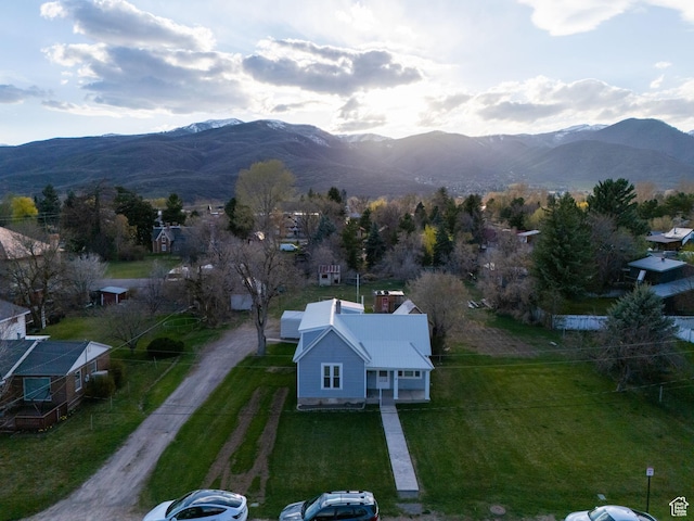 drone / aerial view featuring a mountain view