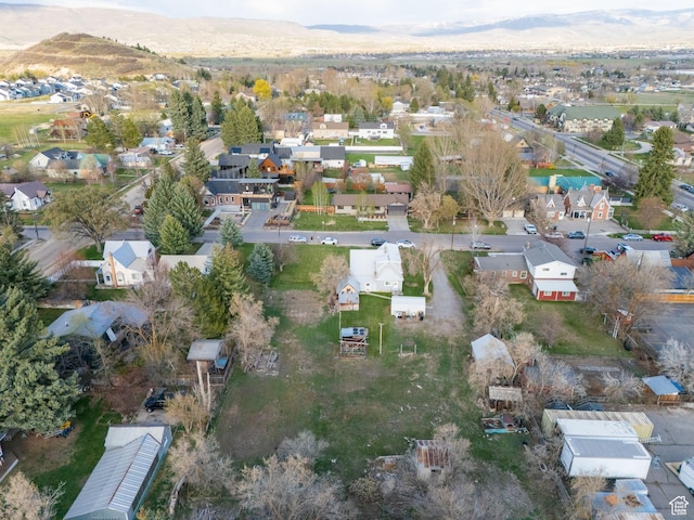 drone / aerial view with a mountain view and a residential view