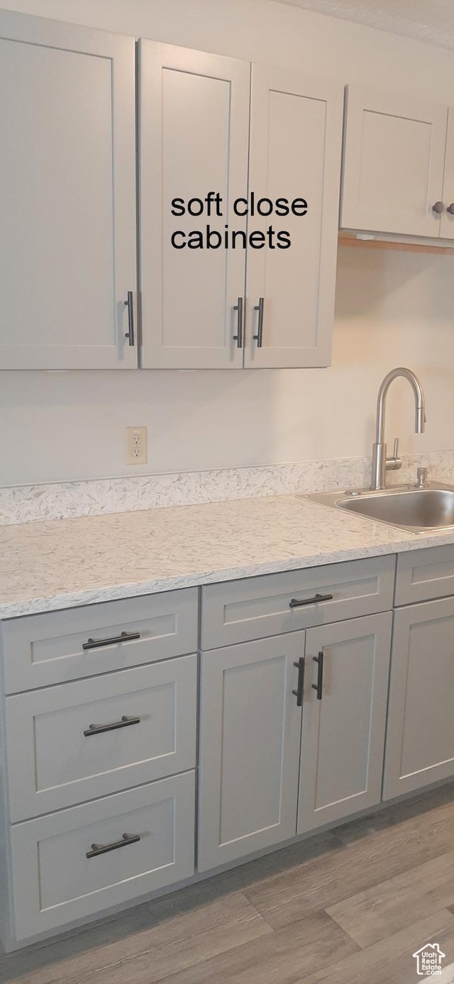 338 E 100 N, Moab, UT 84532 - interior space featuring wood finished floors and a sink