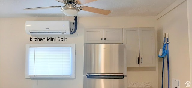 338 E 100 N, Moab, UT 84532 - details with freestanding refrigerator, a wall mounted air conditioner, and a ceiling fan