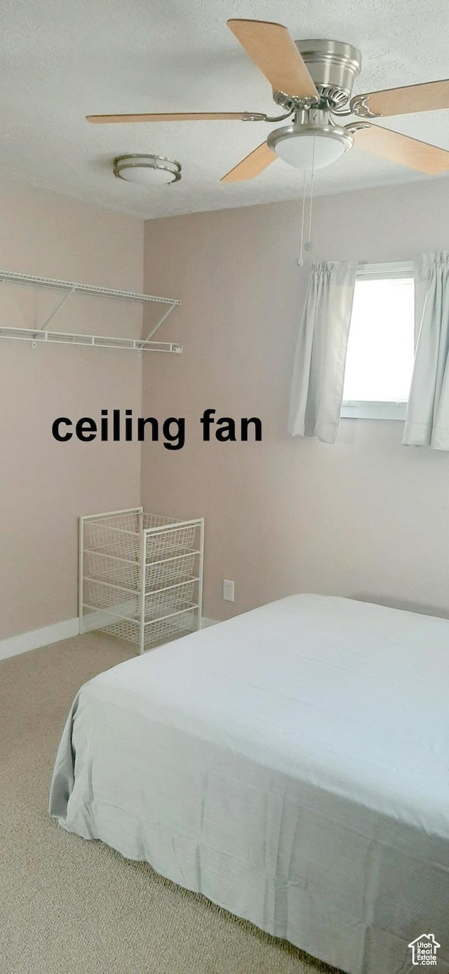 338 E 100 N, Moab, UT 84532 - carpeted bedroom featuring ceiling fan