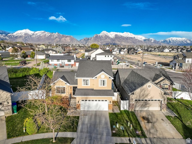 exterior space with a mountain view and a residential view
