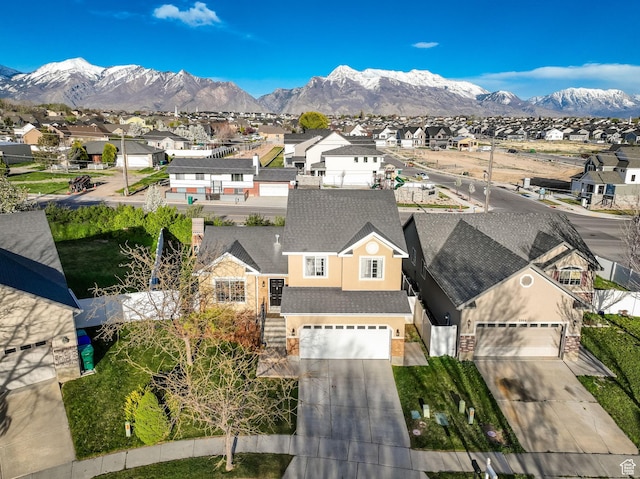 aerial view featuring a residential view and a mountain view