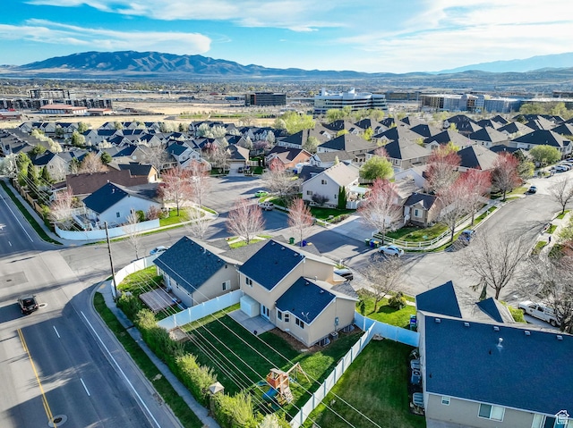 aerial view featuring a mountain view and a residential view