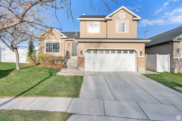 view of front of house featuring driveway, fence, a garage, a front yard, and stucco siding