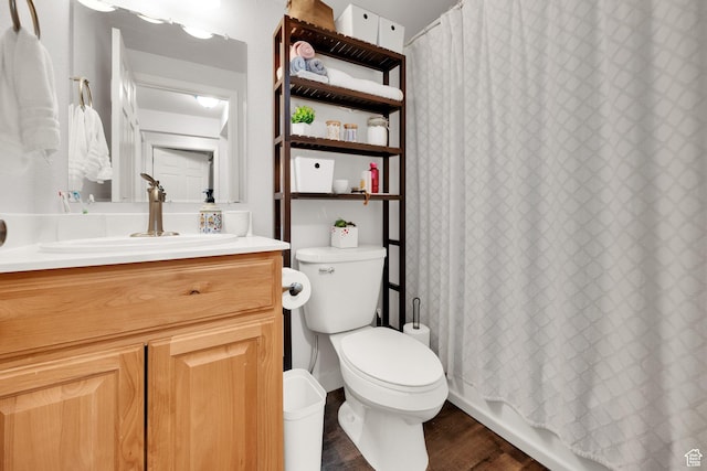 full bathroom with toilet, vanity, wood finished floors, and shower / bathtub combination with curtain
