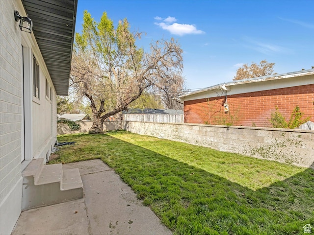 view of yard with fence