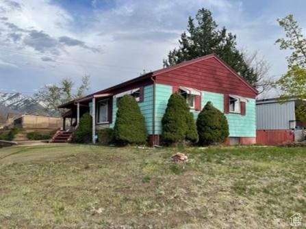 387 W 4575 S, Washington Terrace, UT 84405 - view of side of home with a lawn