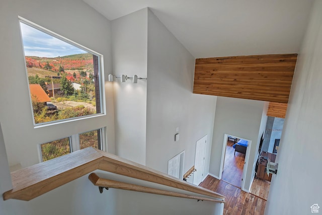 stairs with wood finished floors