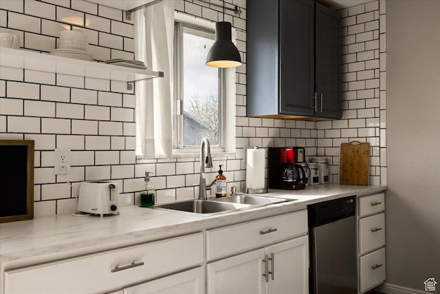 781 N 950 W, Orem, UT 84057 - kitchen featuring white cabinets, backsplash, light countertops, dishwasher, and a sink