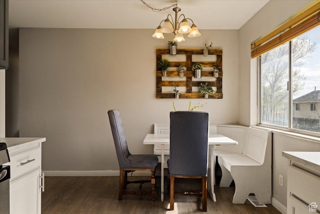 781 N 950 W, Orem, UT 84057 - dining space with a healthy amount of sunlight, dark wood-style floors, and a notable chandelier