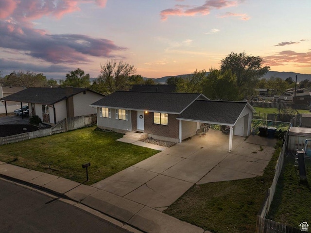 781 N 950 W, Orem, UT 84057 - single story home with driveway, a fenced backyard, and a lawn