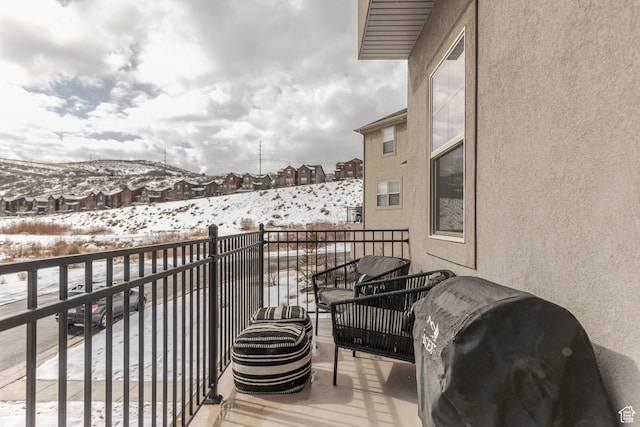 1052 W Cattail Ct Unit E1, Kamas, UT 84036 - snow covered back of property featuring a grill